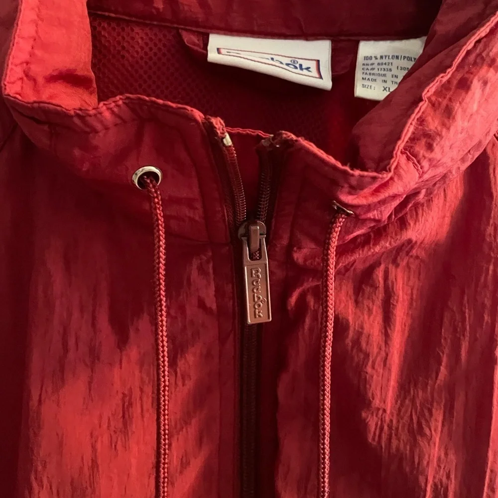 Vintage Reebok Maroon Nylon Windbreaker w/ Hide-away hood zip up - Picture 3 of 10